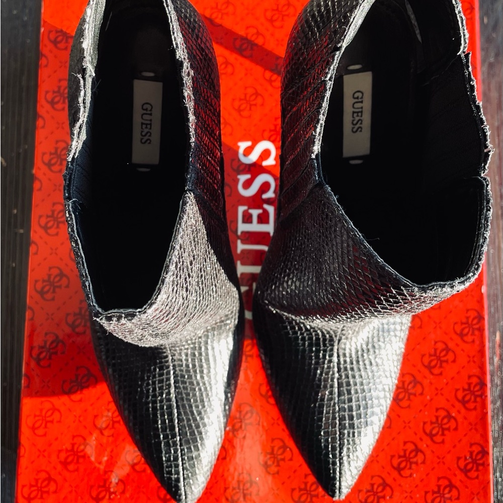 Guess high heal booties size 8.5
